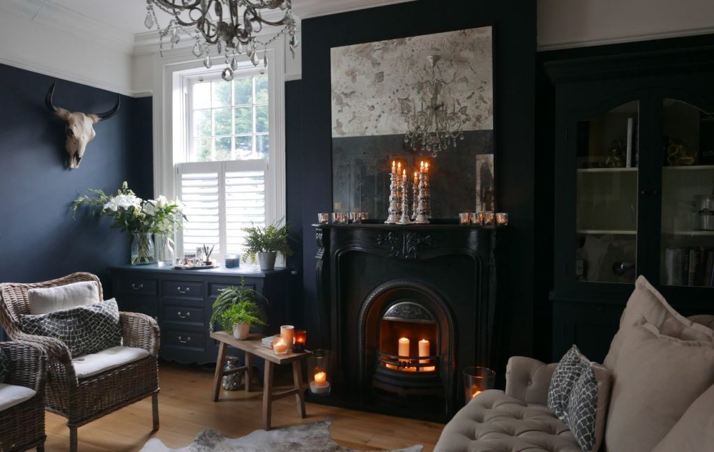 Play with scale - add décor with different height, like a big mirror, a variety of candle holders, etc.