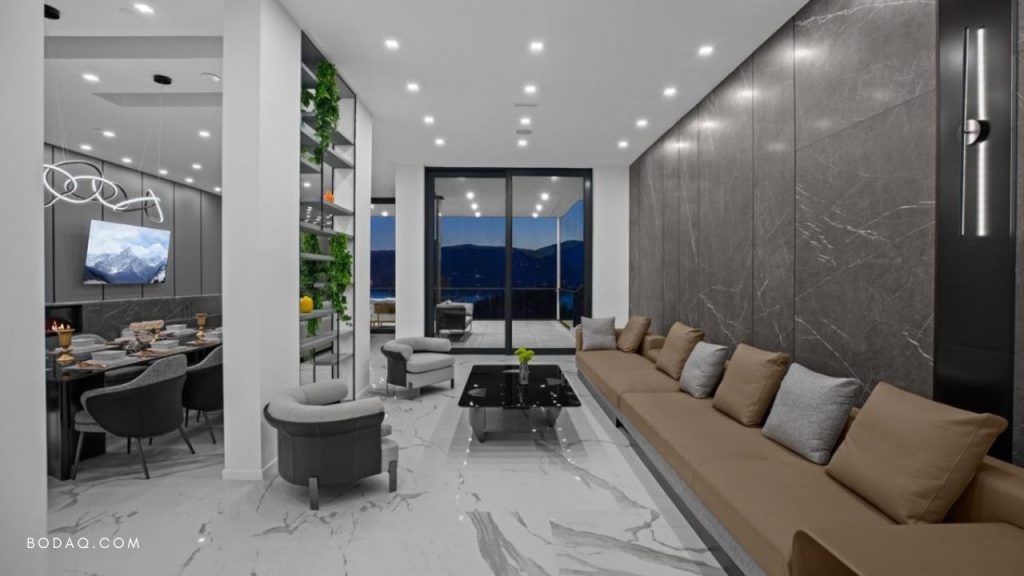 Wall Paneling Design Ideas: From Bedroom to Basement 10 Wall paneling design ideas: PM006 Pietra Grey Marble applied to a wall paneling in the living room